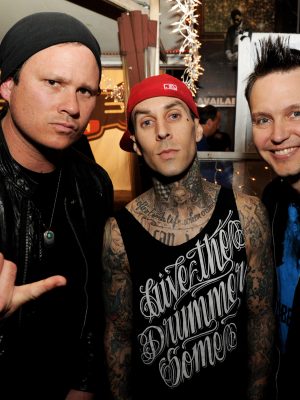 WEST HOLLYWOOD, CA - MAY 23:  (L-R) Musicians Tom DeLonge, Travis Barker and Mark Hoppus of blink-182 pose at a press party of announce the 2011 Honda Civic Tour featuring blink-182 and My Chemical Romance at the Rainbow Bar and Grill on May 23, 2011 in West Hollywood, California.  (Photo by Kevin Winter/Getty Images)